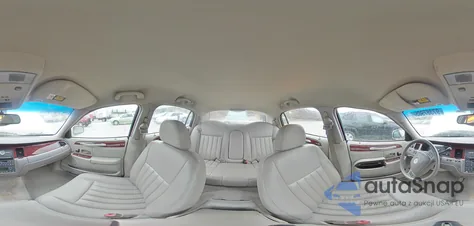 2003 Lincoln Town Car Executive z USA, uszkodzony, nr VIN 1LNHM81W43Y672010